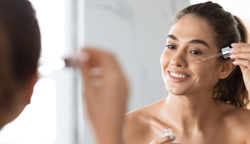 woman using serum